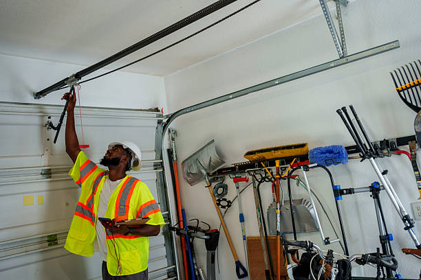 Professional Garage Door Panel Replacement technician working in Greentown, OH